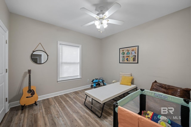 16520 Gaineswood Dr, Fairhope, AL 36532 - sitting room with wood finished floors, a ceiling fan, and baseboards