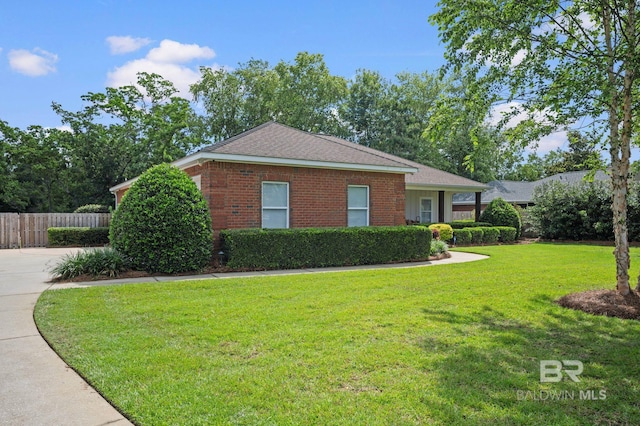 16520 Gaineswood Dr, Fairhope, AL 36532 - view of front facade with brick siding, roof with shingles, and concrete driveway