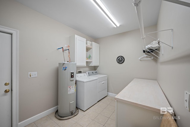 16520 Gaineswood Dr, Fairhope, AL 36532 - washroom featuring water heater, independent washer and dryer, light tile patterned floors, and cabinet space