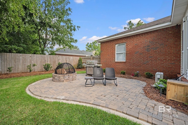 16520 Gaineswood Dr, Fairhope, AL 36532 - view of patio featuring a fire pit and grilling area