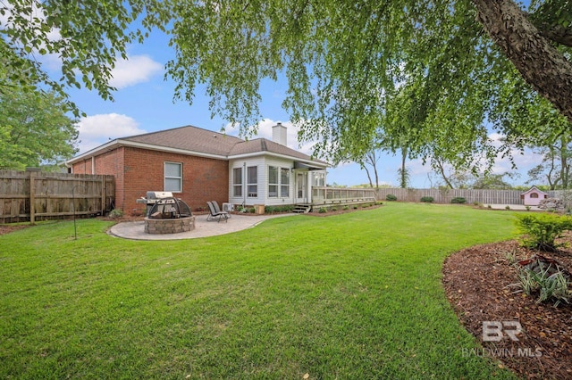 16520 Gaineswood Dr, Fairhope, AL 36532 - view of yard featuring a patio, a fire pit, and a wooden deck