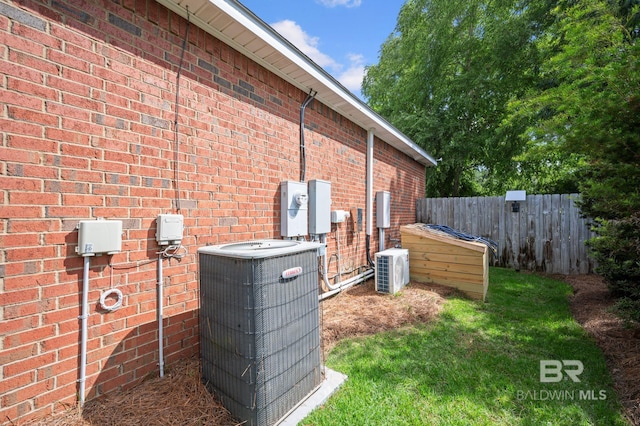 16520 Gaineswood Dr, Fairhope, AL 36532 - view of property exterior featuring central air condition unit and brick siding