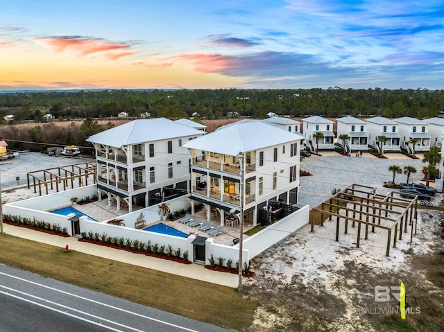 aerial view at dusk with a residential view