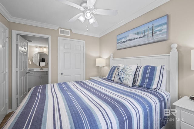 bedroom with crown molding, visible vents, ceiling fan, and ensuite bath