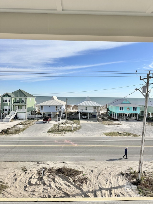 view of road with a residential view