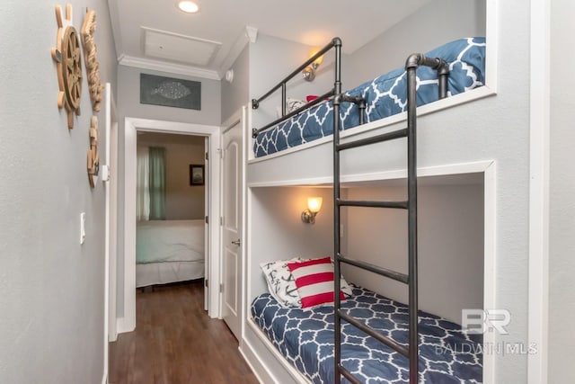 bedroom with dark hardwood / wood-style flooring