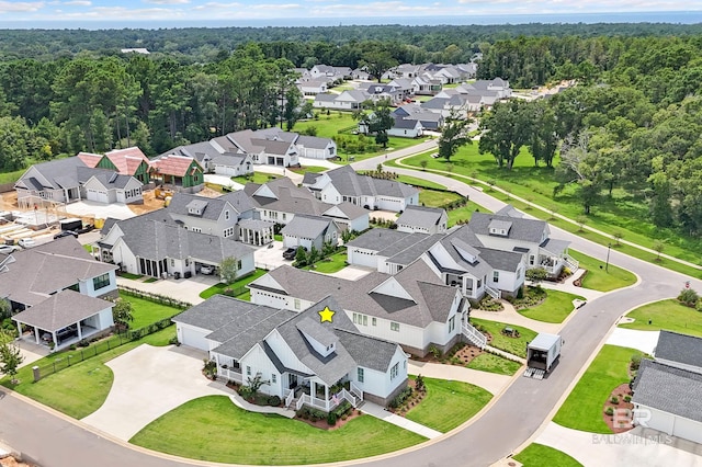 887 Geranium Dr, Fairhope, AL 36532 - aerial perspective of suburban area featuring a heavily wooded area