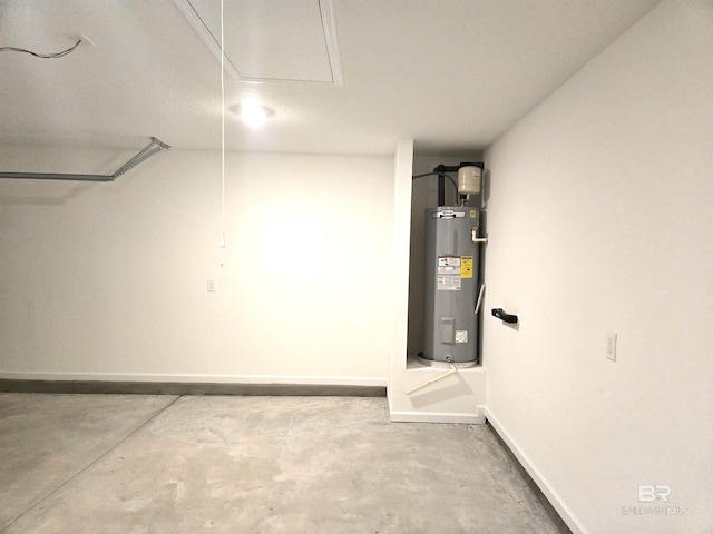 utility room with electric water heater