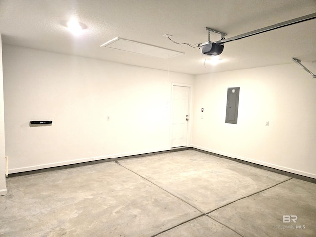 garage featuring a garage door opener and electric panel