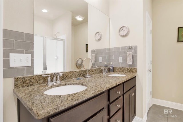 bathroom with vanity, tile patterned floors, and walk in shower