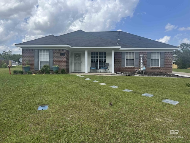 2511 Herman B Towner St, Eight Mile, AL 36613 - view of front of house with brick siding, a front lawn, and a porch