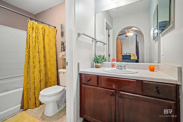 2511 Herman B Towner St, Eight Mile, AL 36613 - bathroom featuring a textured ceiling, vanity, toilet, shower / bath combination with curtain, and tile patterned flooring