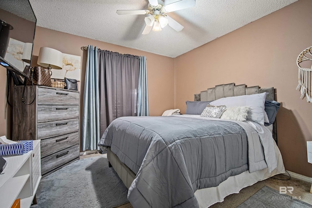 2511 Herman B Towner St, Eight Mile, AL 36613 - carpeted bedroom featuring a textured ceiling and ceiling fan
