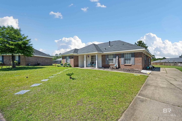 2511 Herman B Towner St, Eight Mile, AL 36613 - ranch-style house featuring brick siding, a front yard, and concrete driveway