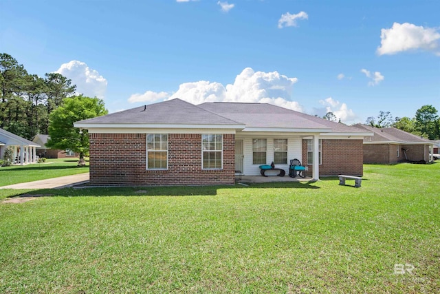 2511 Herman B Towner St, Eight Mile, AL 36613 - back of house featuring a lawn and brick siding