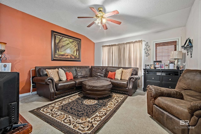 2511 Herman B Towner St, Eight Mile, AL 36613 - living area with ceiling fan, carpet floors, vaulted ceiling, and a textured ceiling