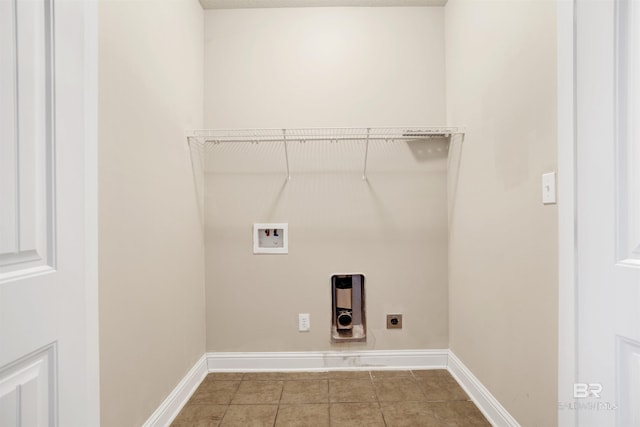 washroom with washer hookup, tile patterned flooring, baseboards, hookup for an electric dryer, and laundry area