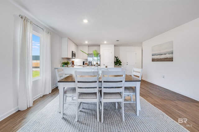 16770 Prado Loop, Loxley, AL 36551 - dining space with light wood-type flooring and recessed lighting