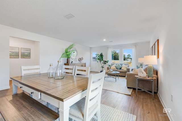 16770 Prado Loop, Loxley, AL 36551 - dining space with light wood finished floors and recessed lighting