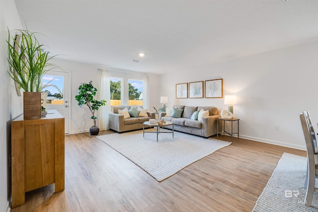 16770 Prado Loop, Loxley, AL 36551 - living area featuring light wood-type flooring and recessed lighting