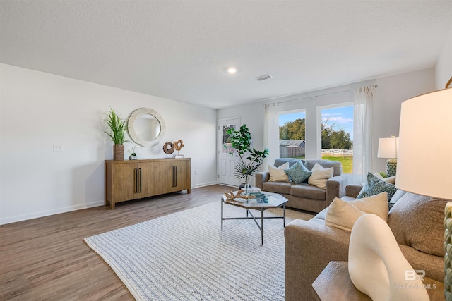 16770 Prado Loop, Loxley, AL 36551 - living room with light wood-type flooring and recessed lighting