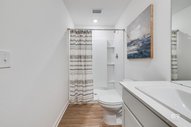 16770 Prado Loop, Loxley, AL 36551 - bathroom with vanity, wood finished floors, and a shower with curtain