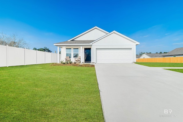 16770 Prado Loop, Loxley, AL 36551 - view of front of house featuring a garage and concrete driveway