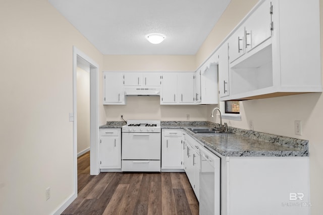 kitchen with white cabinetry, sink, dark hardwood / wood-style floors, a textured ceiling, and white appliances