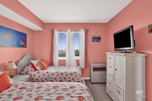 carpeted bedroom with a textured ceiling