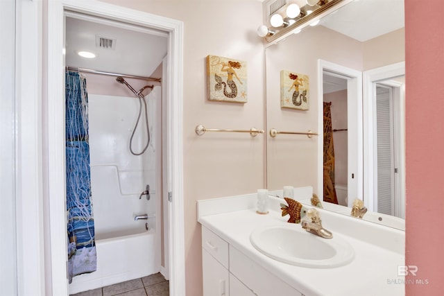 bathroom featuring tile patterned flooring, visible vents, shower / tub combo with curtain, and vanity