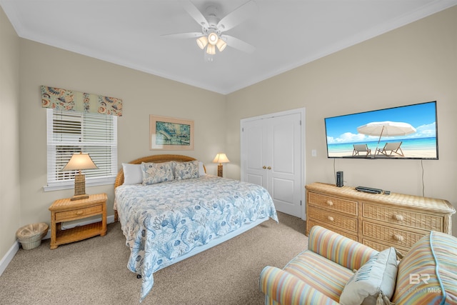 bedroom featuring light colored carpet, ornamental molding, a ceiling fan, and multiple windows