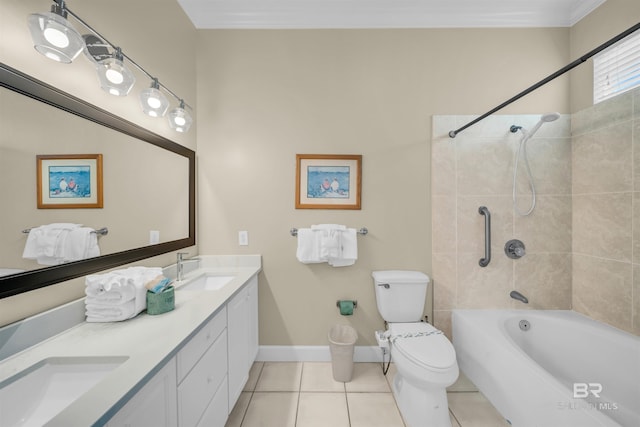 bathroom with a sink, toilet, double vanity, and tile patterned floors