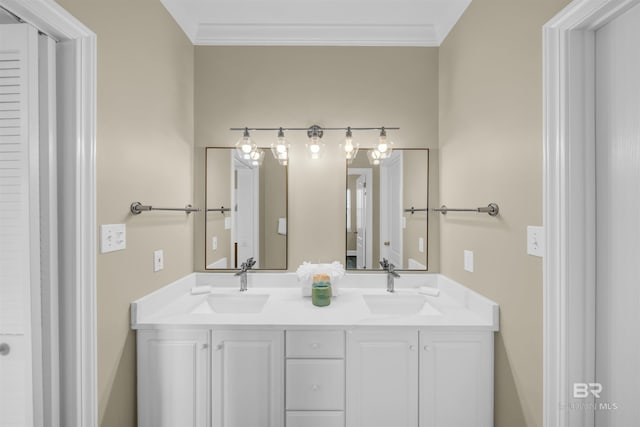 bathroom featuring a sink, double vanity, and crown molding