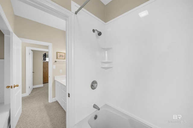 full bathroom featuring vanity, washtub / shower combination, and baseboards