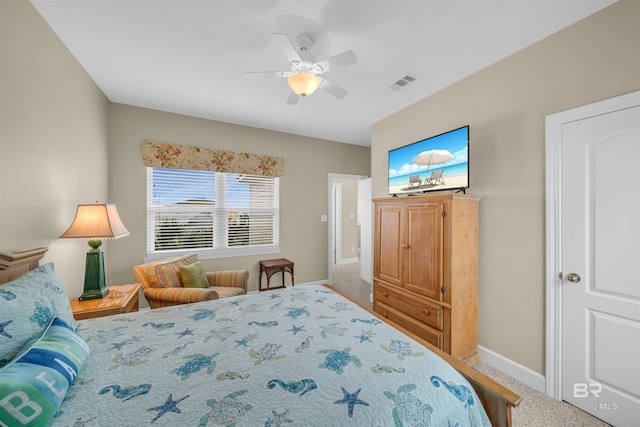 bedroom featuring carpet, baseboards, visible vents, and ceiling fan