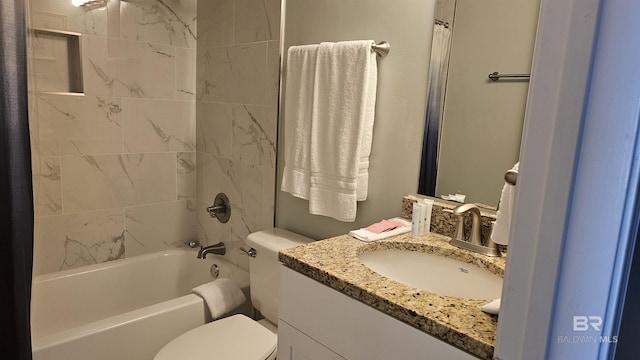 24568 Perdido Beach Blvd Unit 102, Orange Beach, AL 36561 - bathroom with toilet, vanity, and shower / bath combination