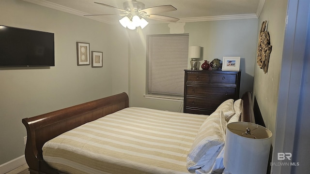 24568 Perdido Beach Blvd Unit 102, Orange Beach, AL 36561 - bedroom featuring baseboards, a ceiling fan, and crown molding