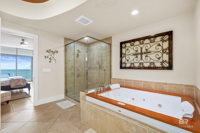 bathroom with shower with separate bathtub, tile patterned flooring, and ceiling fan