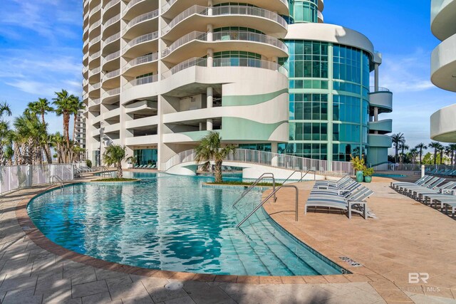 view of pool with a patio area