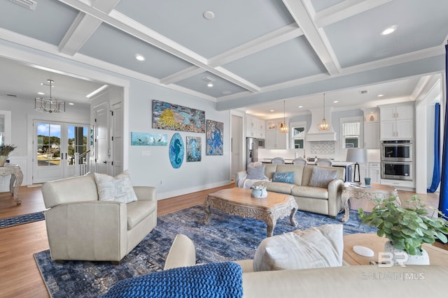 4029 Landfall Dr, Pensacola, FL 32507 - living room featuring coffered ceiling, light wood finished floors, a notable chandelier, and beam ceiling
