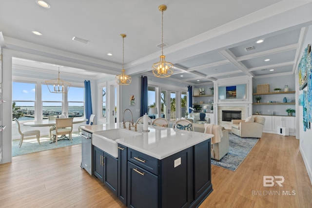 4029 Landfall Dr, Pensacola, FL 32507 - kitchen featuring light wood-style floors, visible vents, a sink, and stainless steel dishwasher