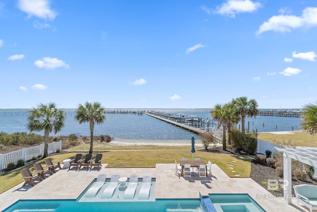 4029 Landfall Dr, Pensacola, FL 32507 - view of swimming pool with fence, a patio, a water view, a fenced in pool, and a lawn