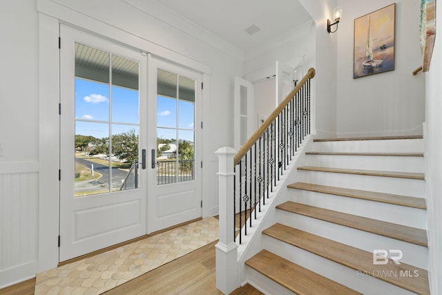 4029 Landfall Dr, Pensacola, FL 32507 - entrance foyer featuring wood finished floors, french doors, and stairway