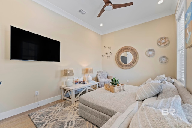 4029 Landfall Dr, Pensacola, FL 32507 - living room featuring ornamental molding, baseboards, visible vents, a ceiling fan, and wood finished floors