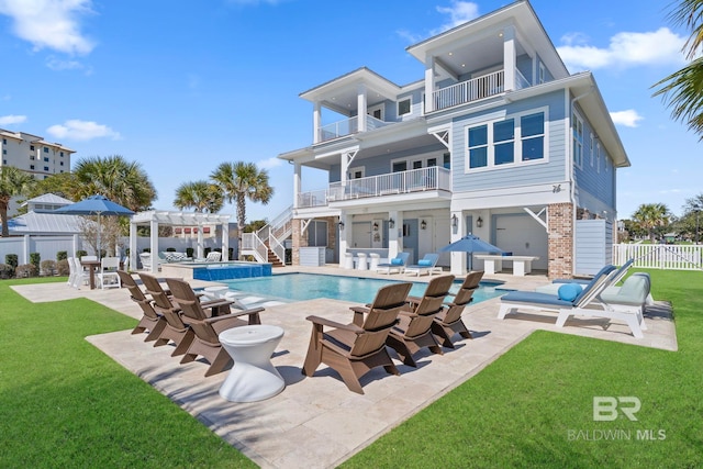 4029 Landfall Dr, Pensacola, FL 32507 - back of house featuring a balcony, a patio area, fence, and a pergola
