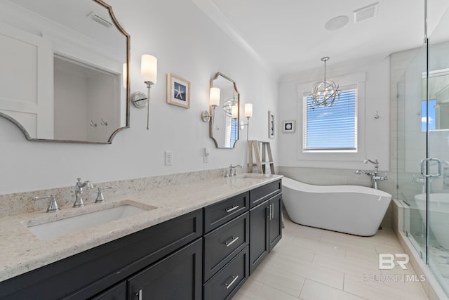 4029 Landfall Dr, Pensacola, FL 32507 - full bathroom with a shower stall, double vanity, a freestanding tub, and a sink