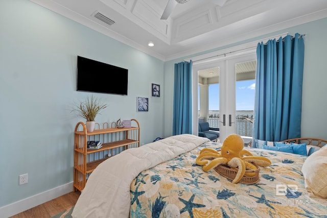 4029 Landfall Dr, Pensacola, FL 32507 - bedroom with visible vents, baseboards, ornamental molding, wood finished floors, and french doors