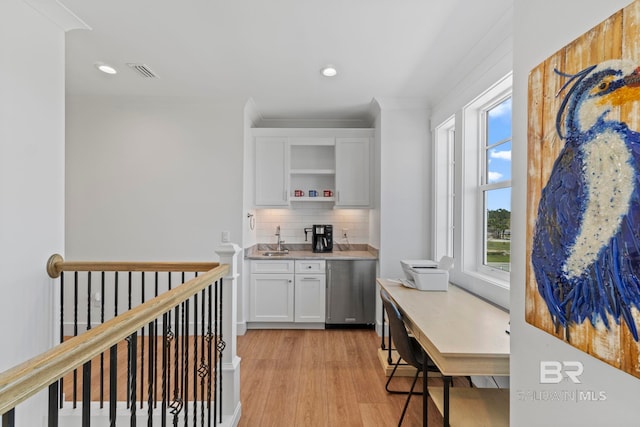 4029 Landfall Dr, Pensacola, FL 32507 - kitchen with white cabinetry, open shelves, backsplash, a sink, and visible vents