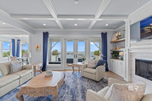 4029 Landfall Dr, Pensacola, FL 32507 - living area featuring beam ceiling, wood finished floors, and plenty of natural light