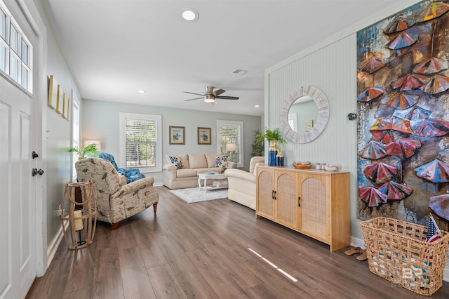 living area with recessed lighting, baseboards, wood finished floors, and a ceiling fan